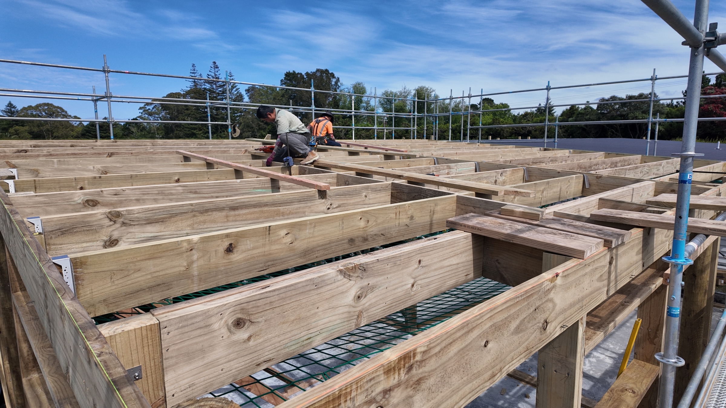 Timber roof framing under construction