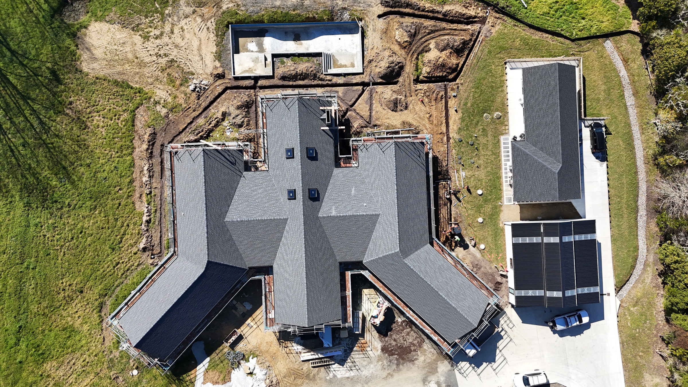 Overhead view of the multi-wing roof layout